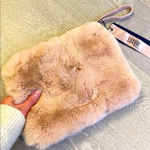 NEW Soft pink fur pounch